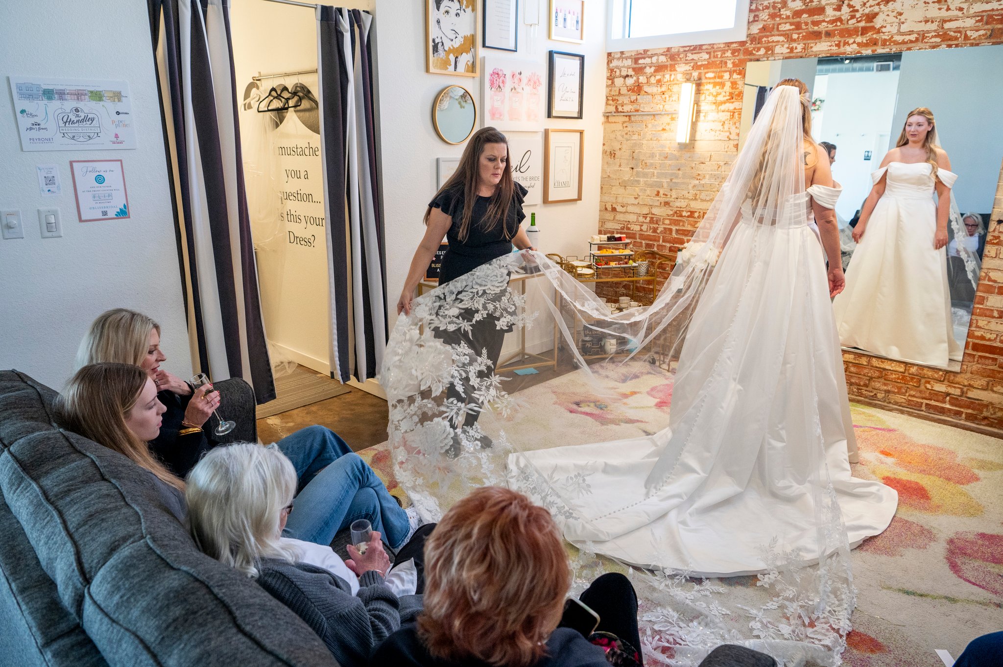 Bride in a private appointment suite at Bliss Bridal Salon in Fort Worth