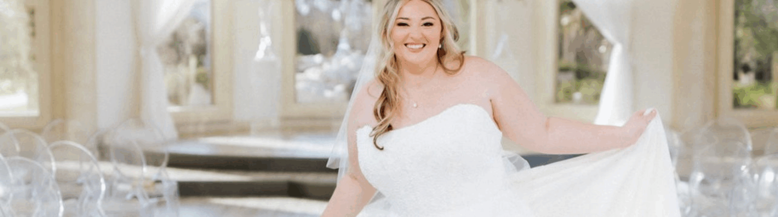 Bride portrait on her wedding day wearing her gown