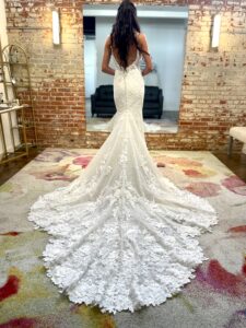 Martina Liana 1305 Beaded wedding dress with intricate lace details and long train in fort worth bridal shop