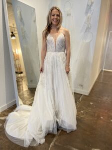 Haley Mai Bridal A-line wedding dress with glitter appliques throughout the tulle a-line wedding dress