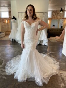 Haley Mai bridal lace off the shoulder fit and flare wedding dress in fort worth bridal shop