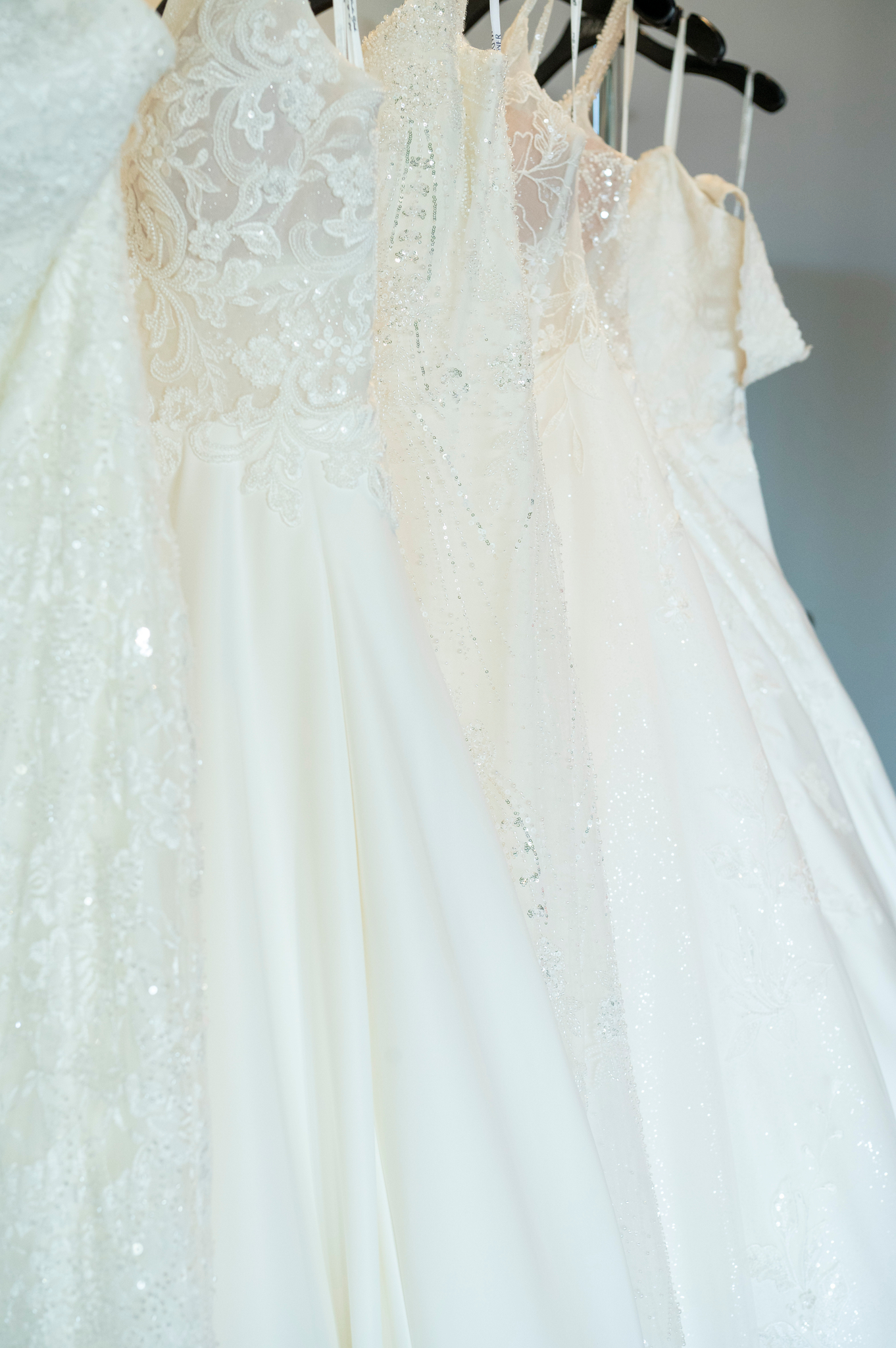 Bride shopping off the rack wedding dresses at Bliss Bridal Salon